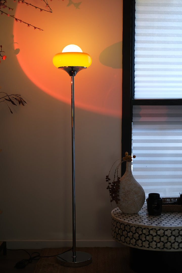 Avery Egg Tart Floor Lamp Set with curved glass dome shades in orange and white in a room setting