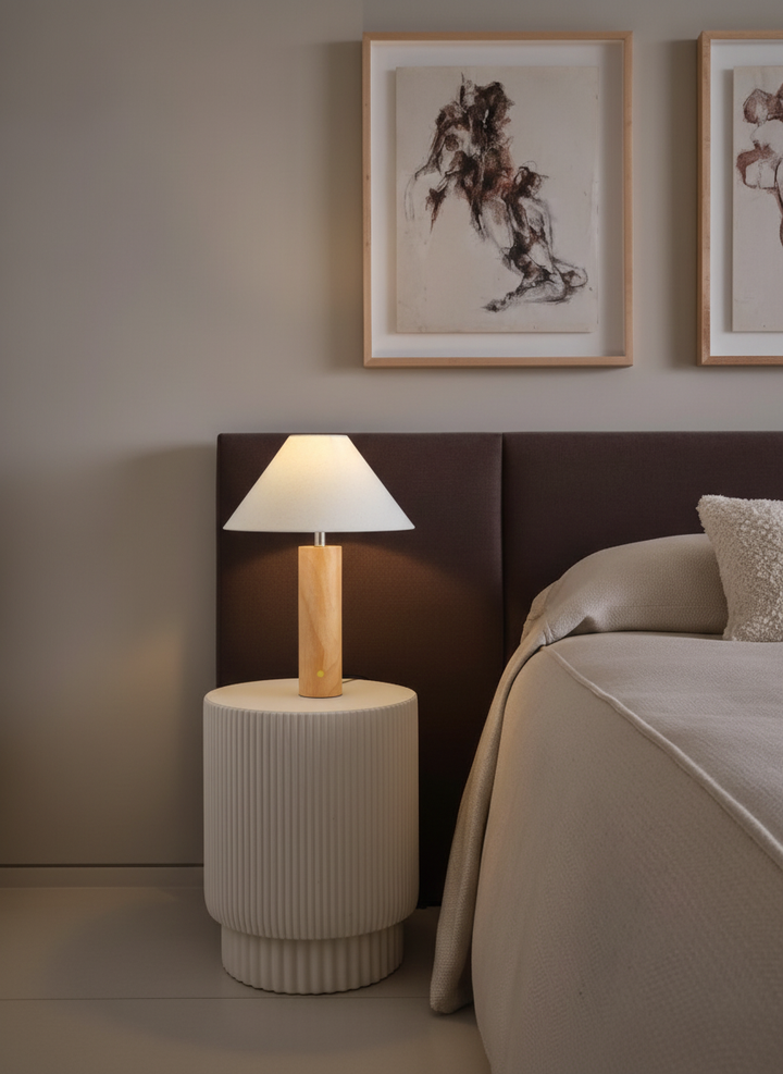 Morgan Table Lamp in natural wood with linen shade on bedside table