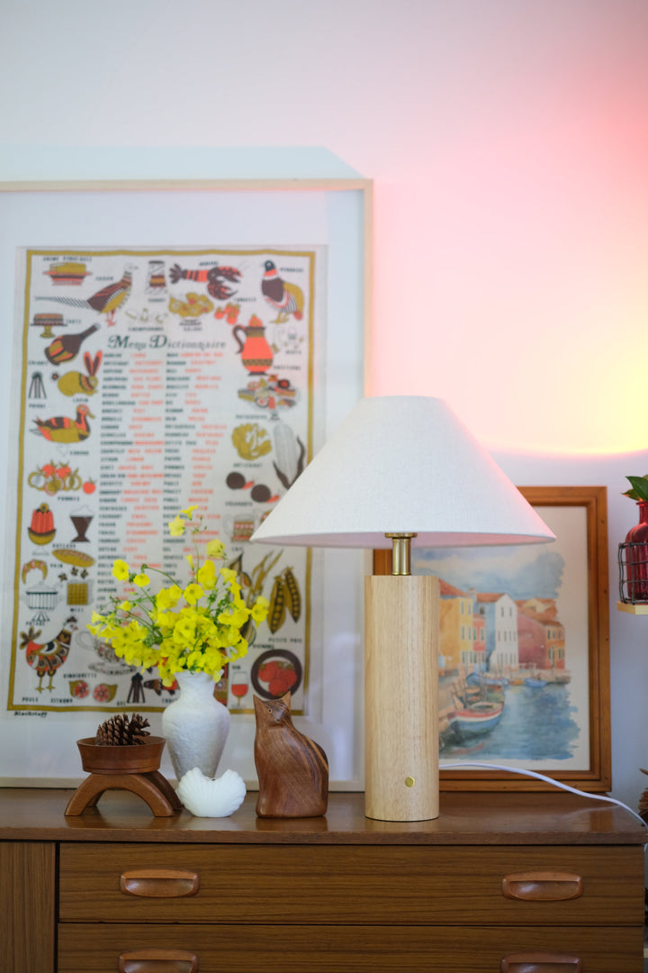 Modern Scandinavian bedside lighting setup featuring Morgan Lamp