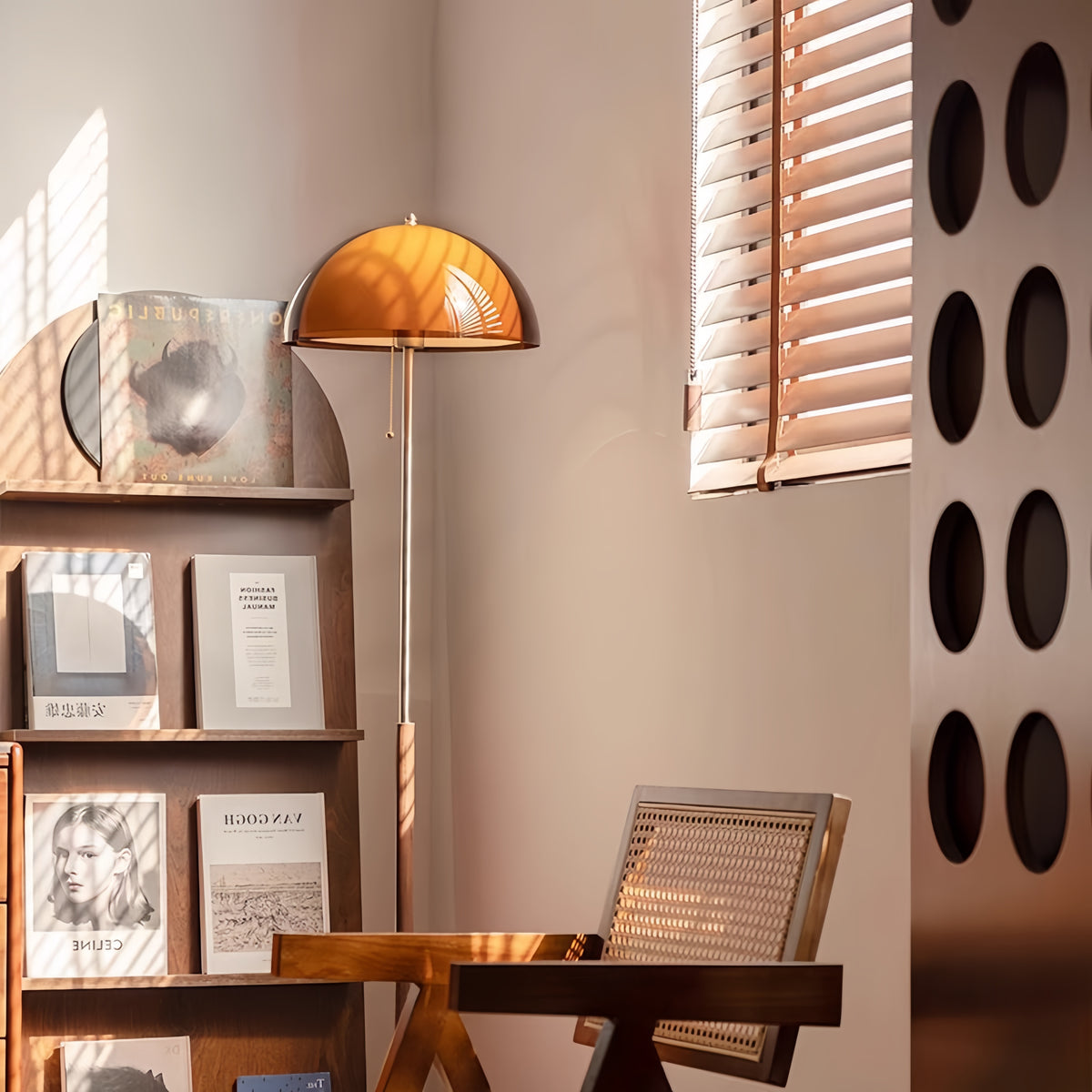 In the early morning, sunlight streamed onto the Coby+ Mushroom Bauhaus Floor Lamp with Pull Chain in the room.
